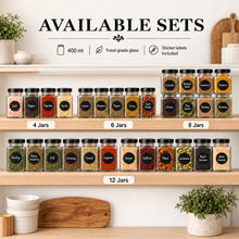 A promotional display showing multiple glass spice jars arranged on wooden shelves under the heading 'AVAILABLE SETS.' The image highlights different jar counts: 4 jars, 6 jars, 8 jars, 12 jars, with feature callouts including 400 ml capacity, food-grade glass, and sticker labels included.