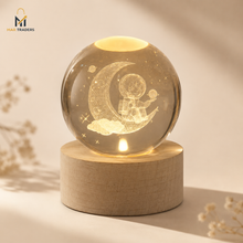 Astronaut crystal ball night light with moon design and warm LED base