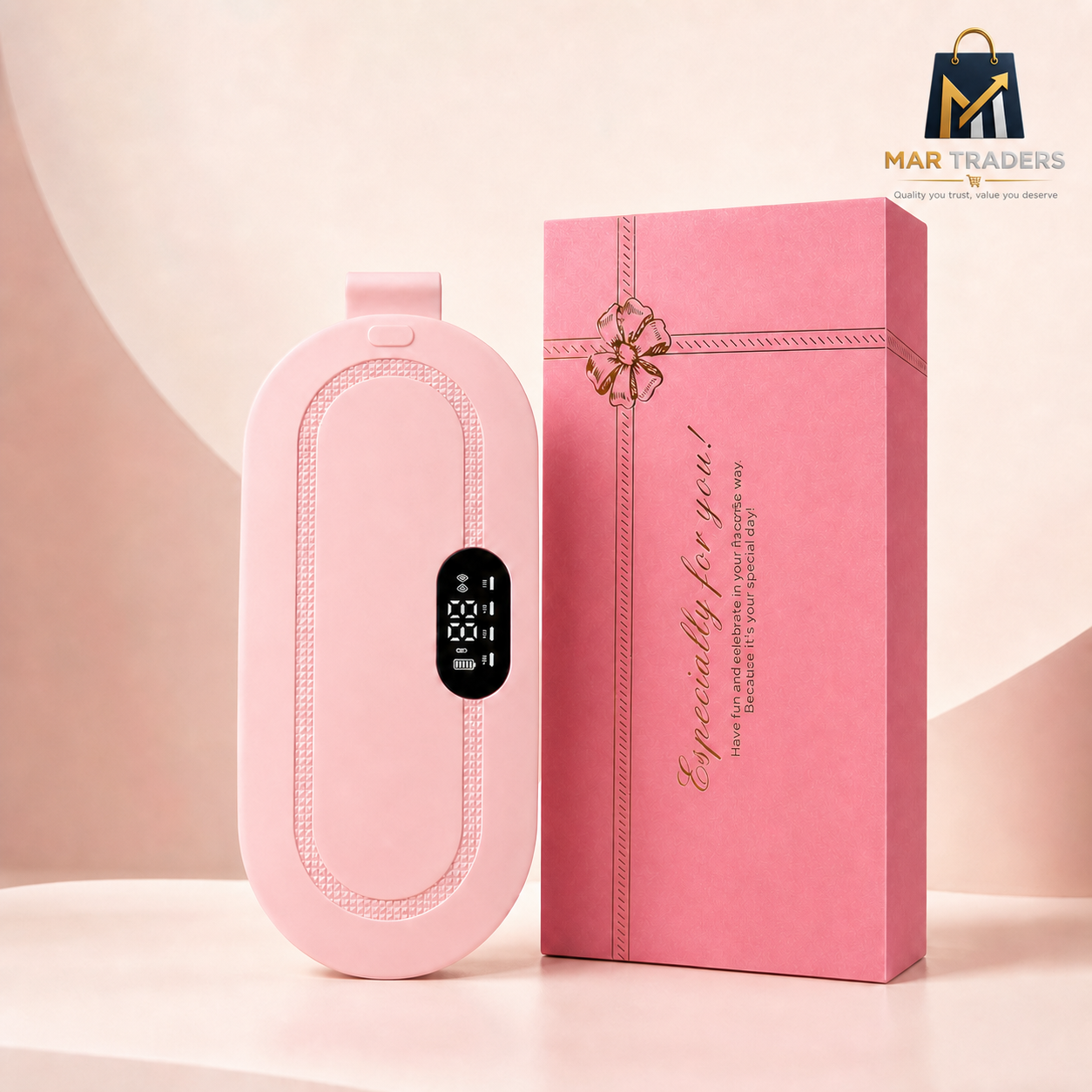 MAR Traders pink portable heating pad with digital display beside its matching floral gift box