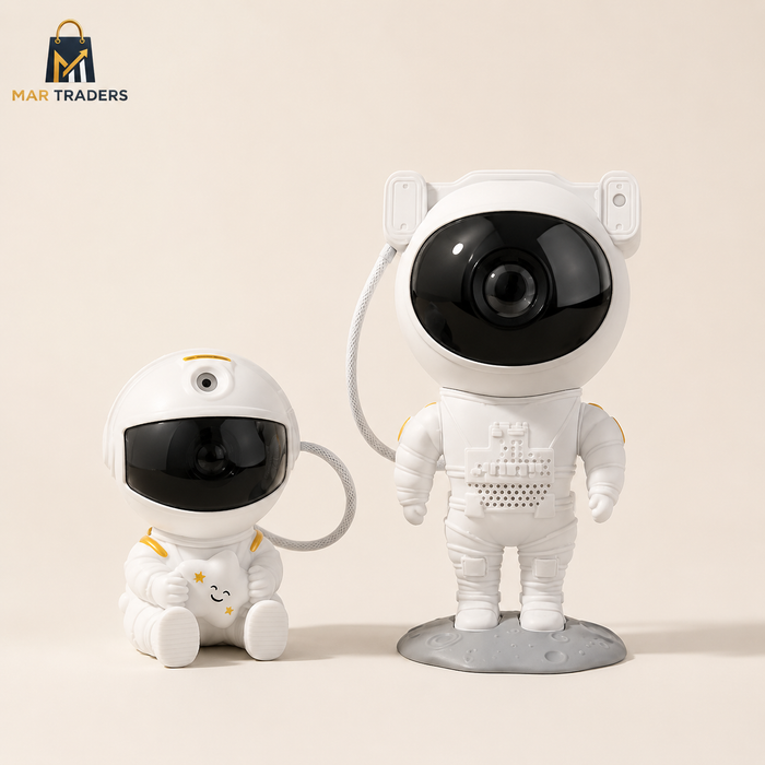 Big and small astronaut galaxy projector lamps in white