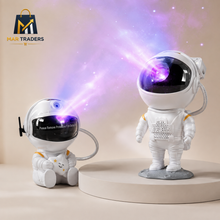 Astronaut galaxy projector casting colourful starry light